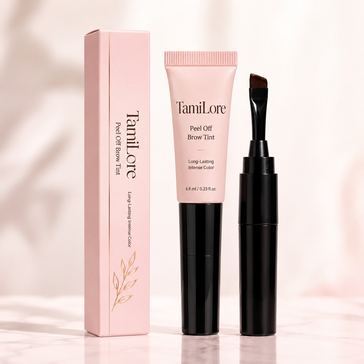 TamiLore Peel-Off Brauen Tint — Tube und Box auf rosa Hintergrund